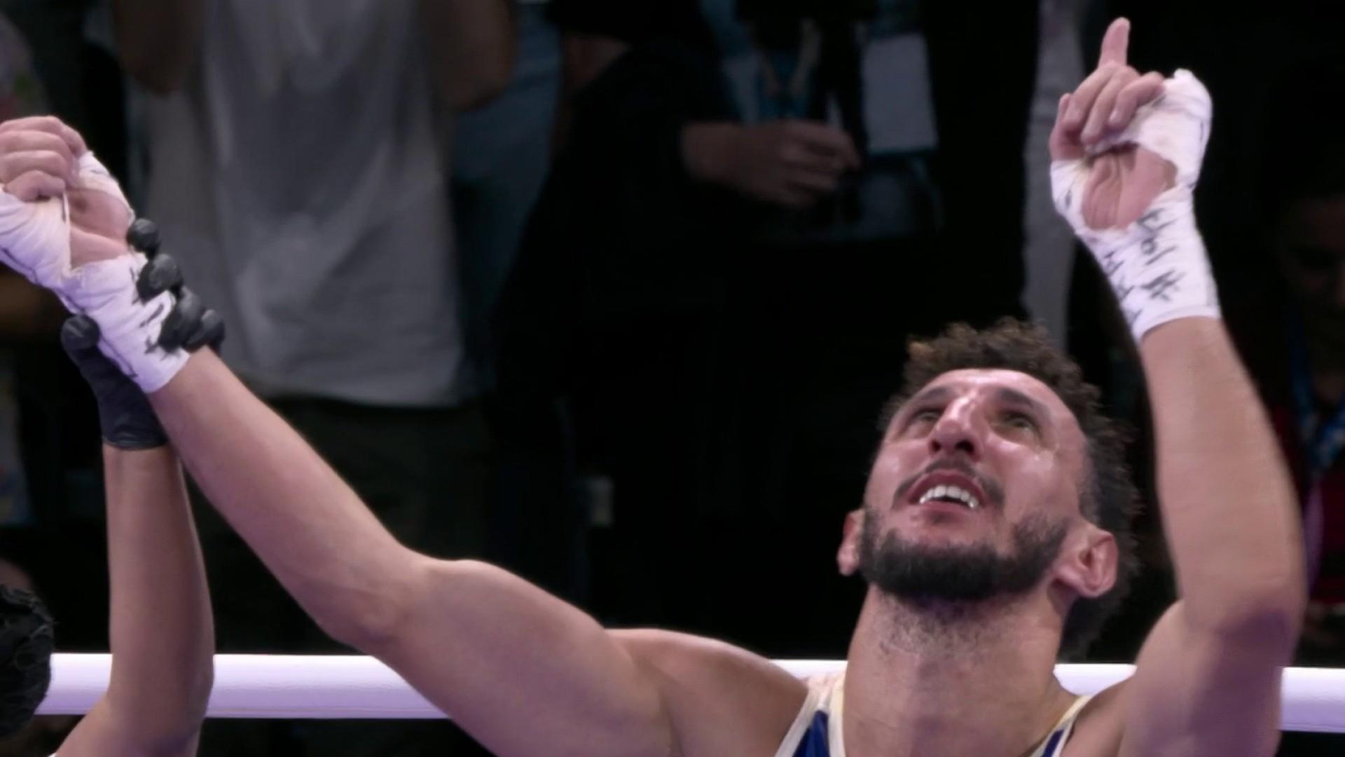 Sofiane Oumiha qualified for the Olympic boxing final in the under 63.5 kg category by beating Canadian Wyatt Sanford.